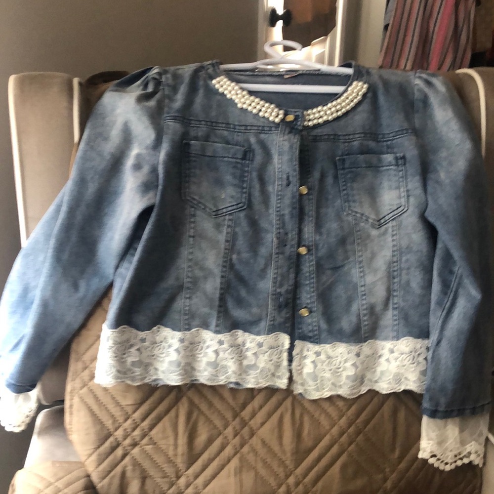 Jean Jacket with faux pearls at neck. Has been altered with lace.